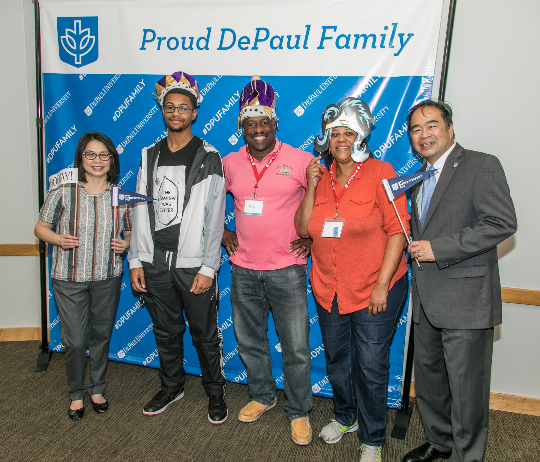 Josephine Esteban, left, and DePaul University President A. Gabriel Esteban, Ph.D., right, pose with the Broomfield family (Koby, Fred and Beverly) as they arrive for the annual Family Weekend Kickoff celebration. Student groups performed for the guests during a buffet dinner that started the weekend of festivities. (DePaul University/Jamie Moncrief)